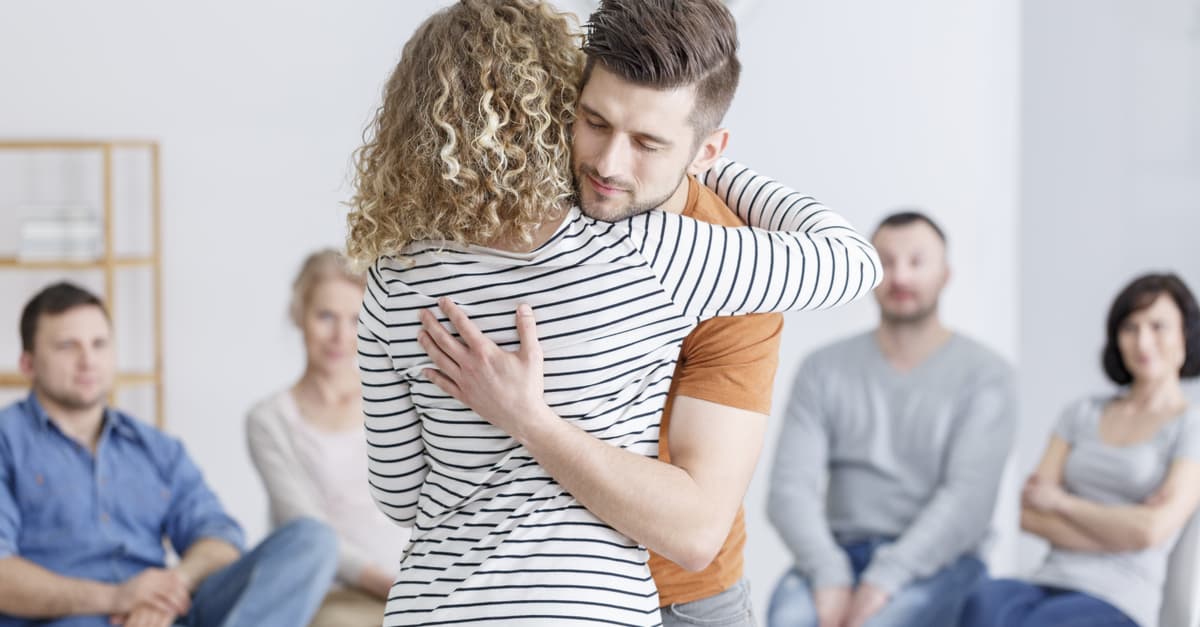 man-and-woman-supporting-eachother