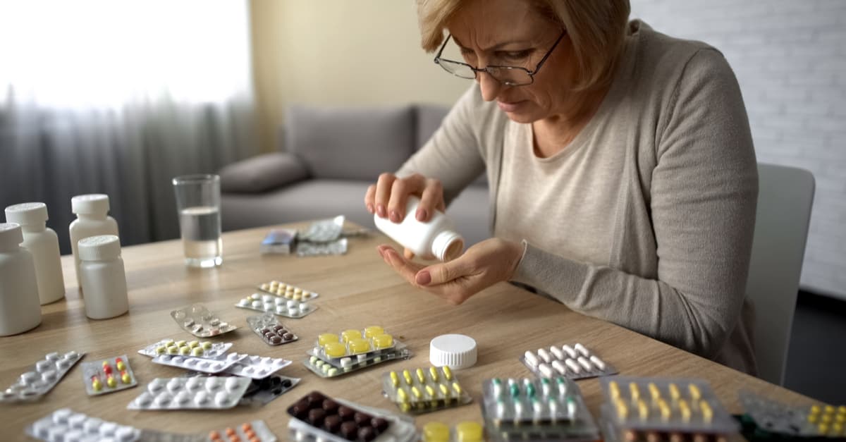 woman-surrounded-by-medication